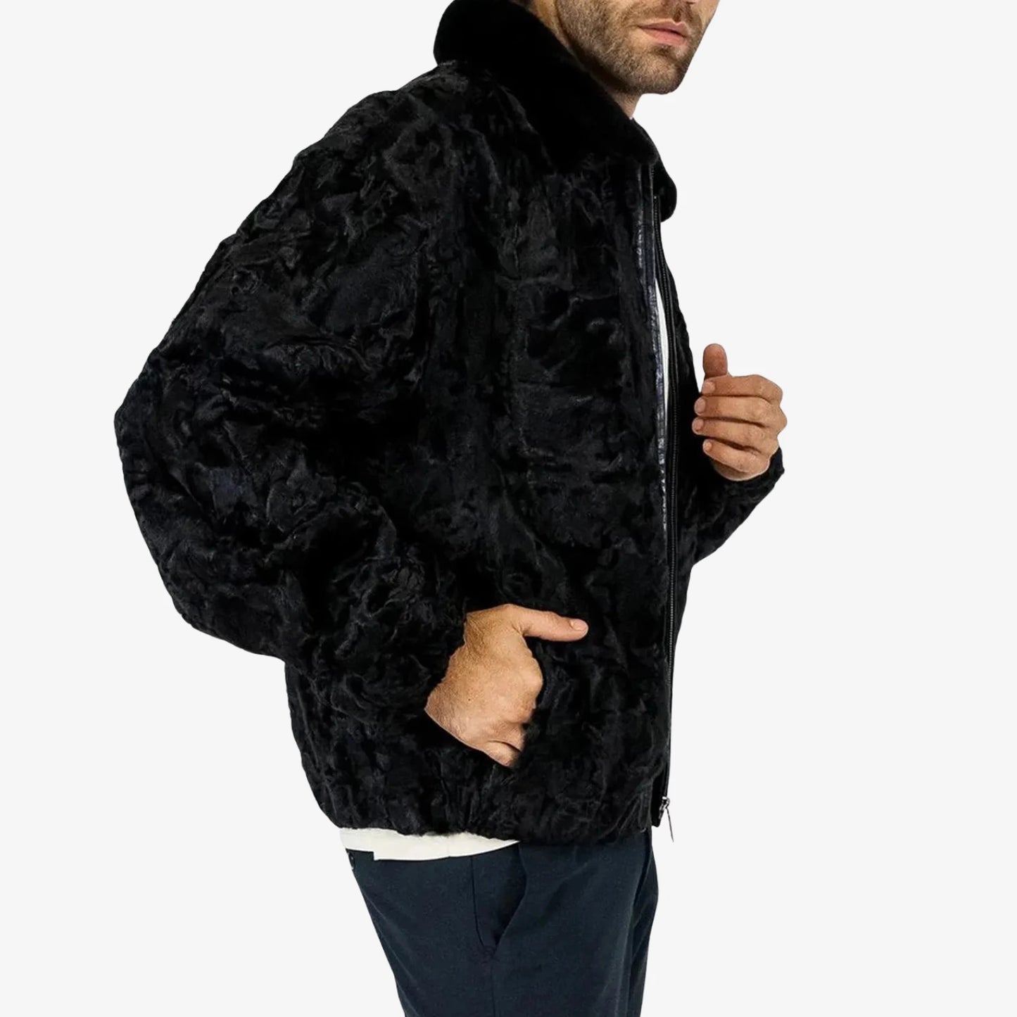Person wearing a black textured jacket on a white background