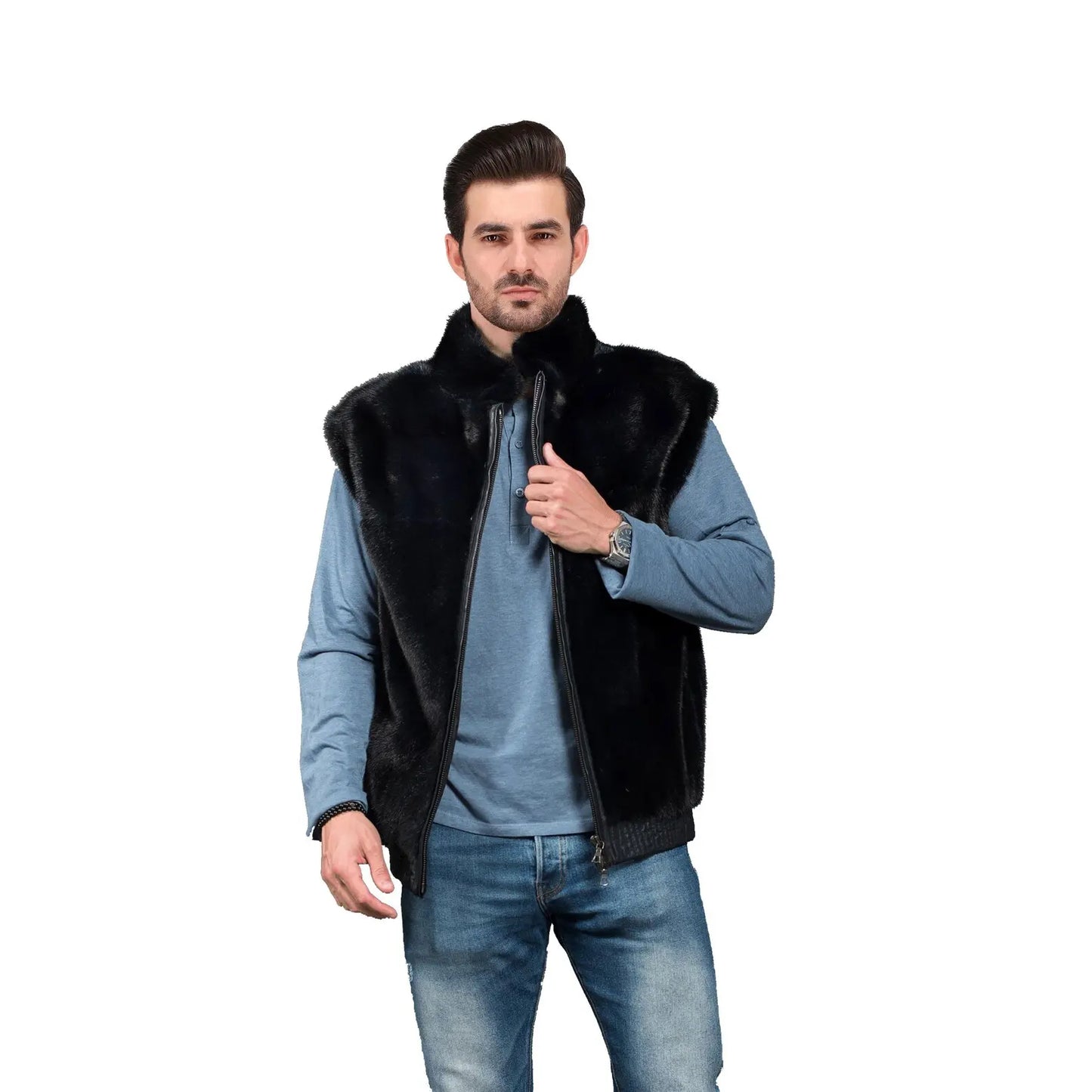 Man wearing a black fur vest over a blue shirt on a white background