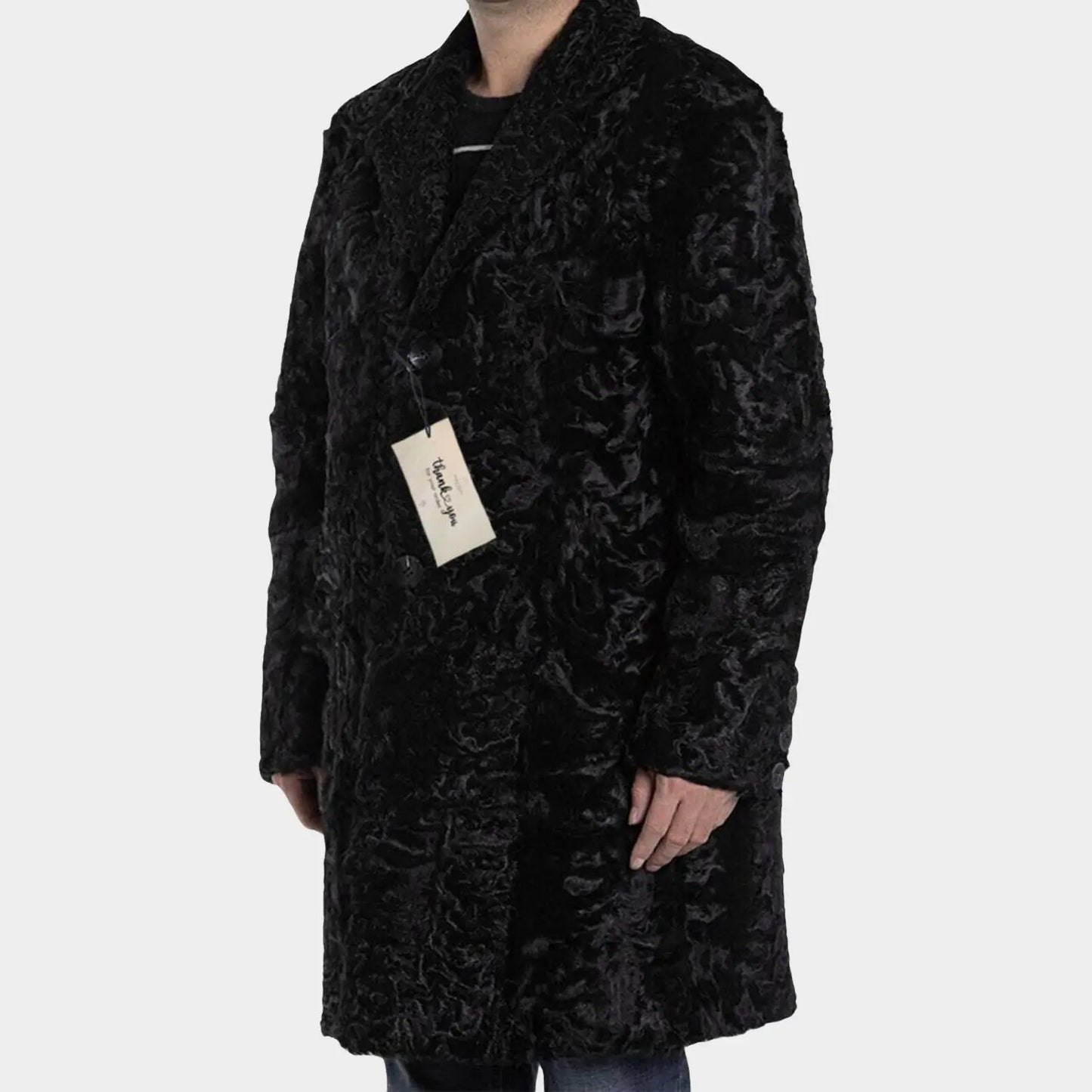 Black textured coat worn by a person on a white background