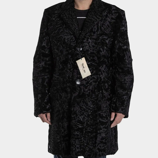 Black textured coat with a tag on a white background