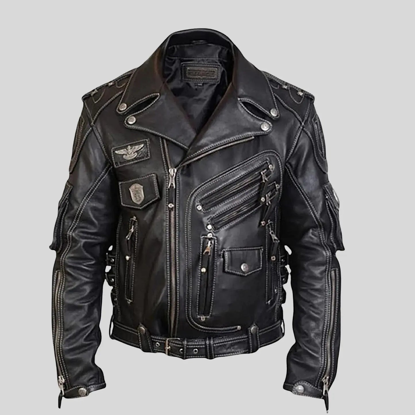 Black leather jacket with patches on a gray background