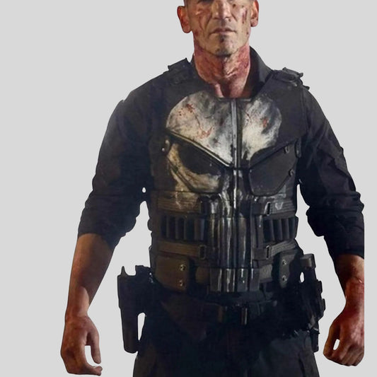 Person wearing a tactical vest with a skull design on a plain background