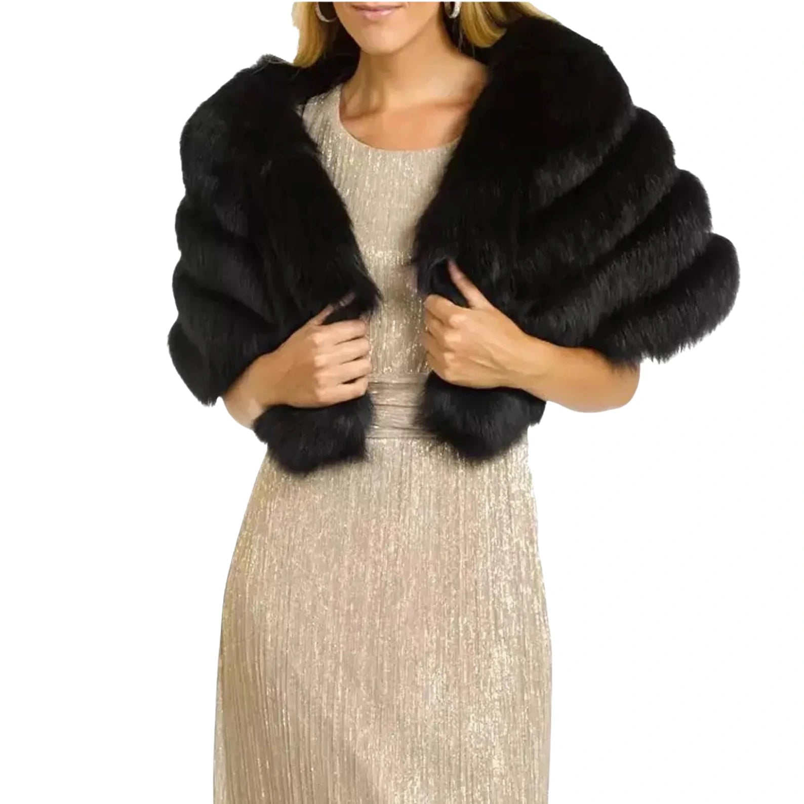 Black fur shrug over a beige dress on a white background