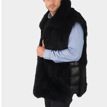 Man wearing a black fur vest over a light blue shirt on a white background