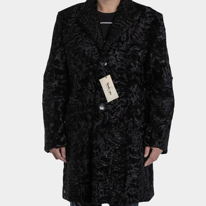 Black textured coat with a tag on a white background