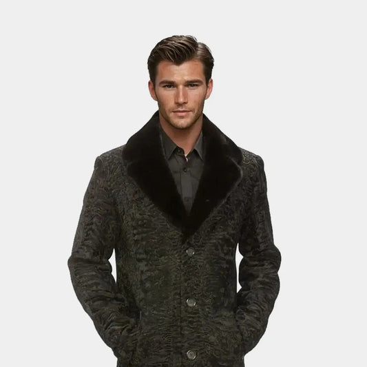 Man wearing a dark coat with a fur collar on a white background
