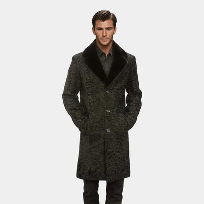 Man wearing a dark gray coat with a fur collar on a white background