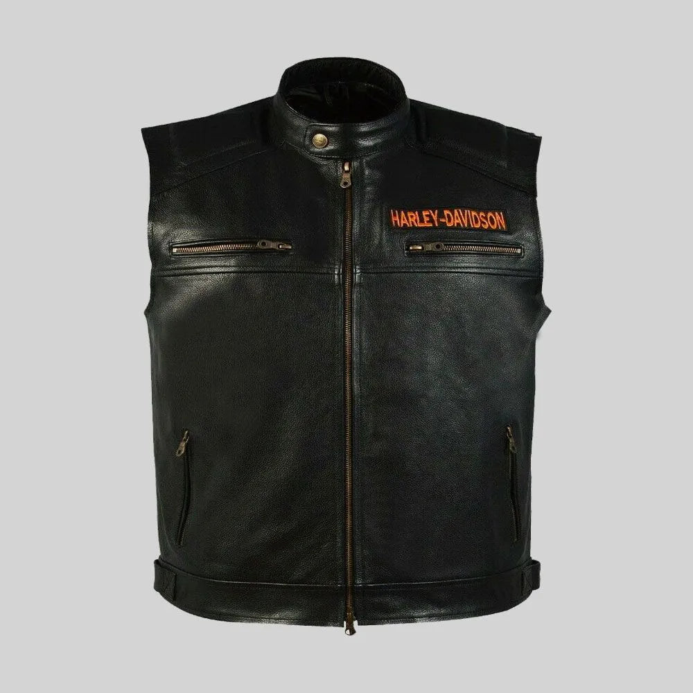 Black leather vest with Harley-Davidson logo on a gray background