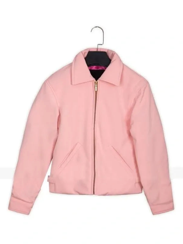Pink jacket on a hanger against a white background