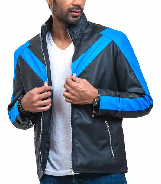 Man wearing a black and blue jacket on a white background
