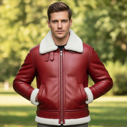 Man wearing a red leather jacket with white fur trim standing outdoors.
