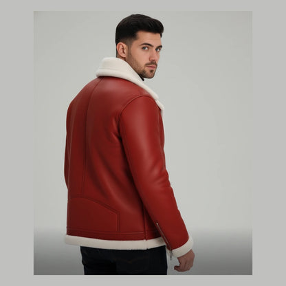 Man wearing a red leather jacket with white fur lining on a gray background